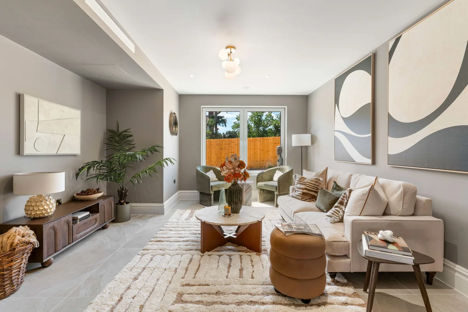 Showhome living room with doors overlooking the garden